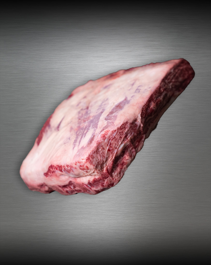 Beef Short Ribs US-Beef roh, edel präsentiert vor metallischem Hintergrund – Cedar River Farms Premium